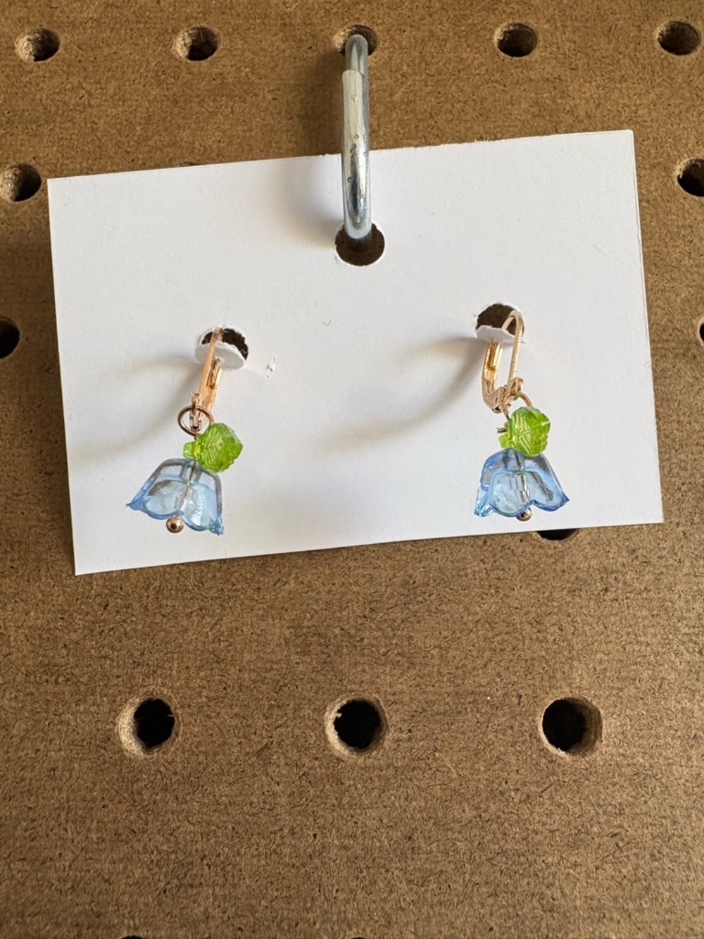 Hand Crafted Blue Flower Earrings with Green Bead Accents